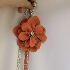 Leather belt with silver chain and faux jewel